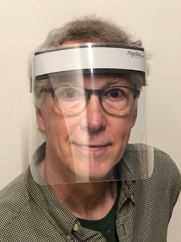 Don Basch, owner of Photodon, pictured wearing a personal protection mask he made.