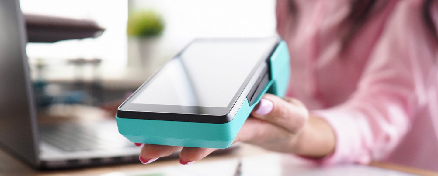 Woman holding POS